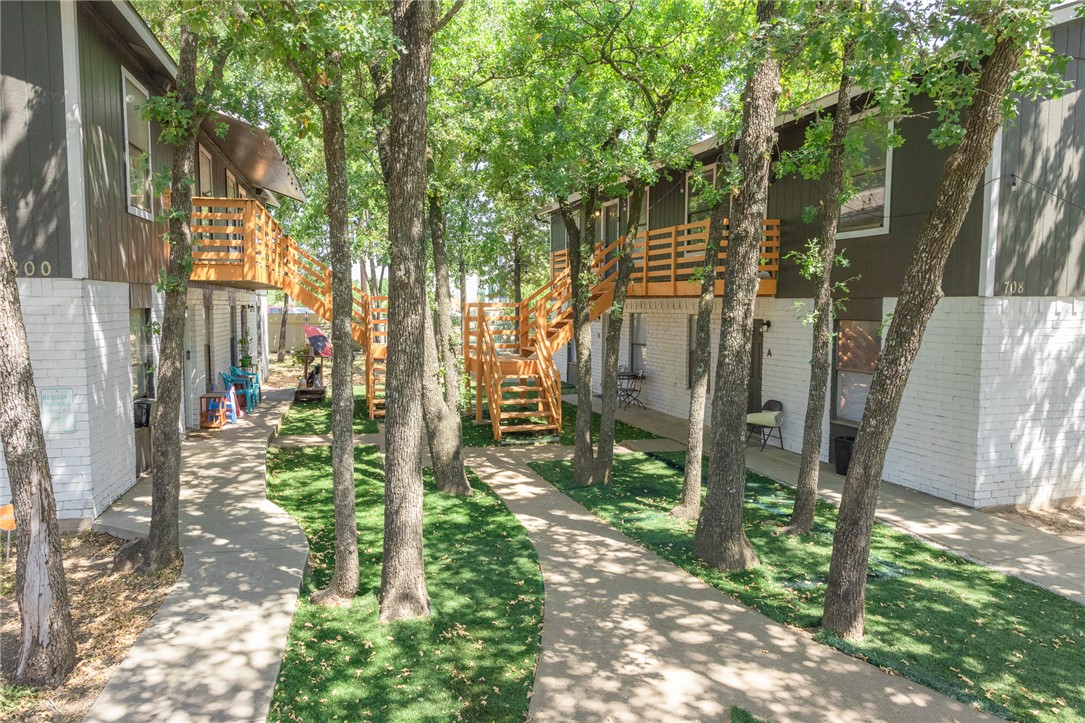 800 Navidad Street Bryan, TX 77801 - Photo 2 of 42 View of yard featuring stairs and a deck