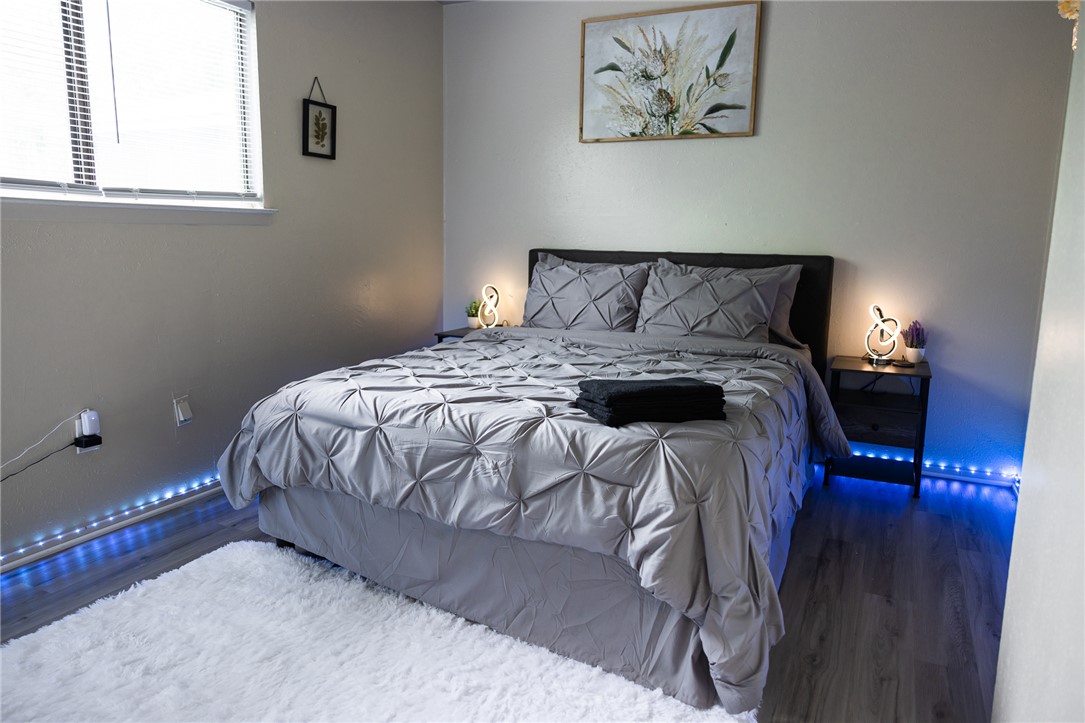 800 Navidad Street Bryan, TX 77801 - Photo 26 of 42 Bedroom featuring wood finished floors