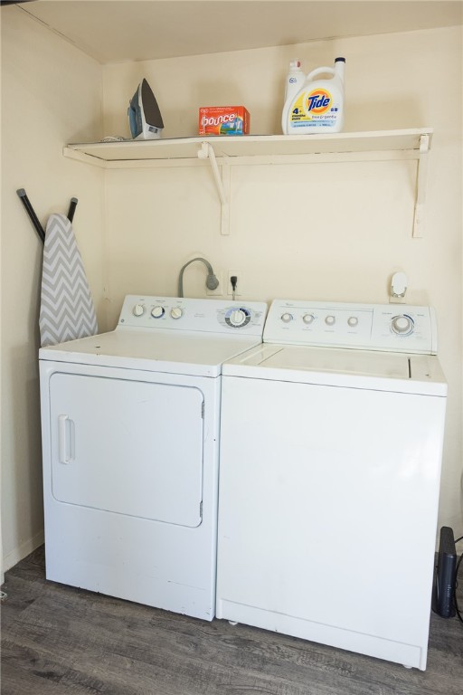 800 Navidad Street Bryan, TX 77801 - Photo 10 of 42 Laundry room with independent washer and dryer and dark wood finished floors