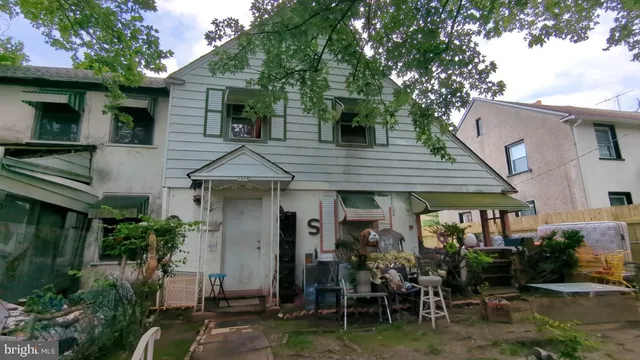 a front view of a house with a porch