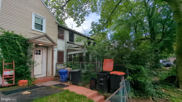 a backyard of a house with seating space