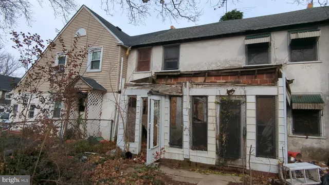 a front view of a house with glass windows
