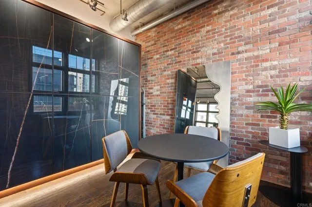 a view of a hallway with washer and dryer