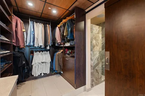 a view of a balcony with table and chairs