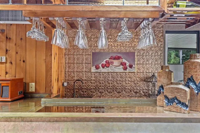 a bedroom with furniture and wooden floor