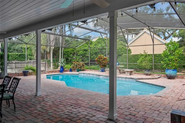a view of yard with swimming pool