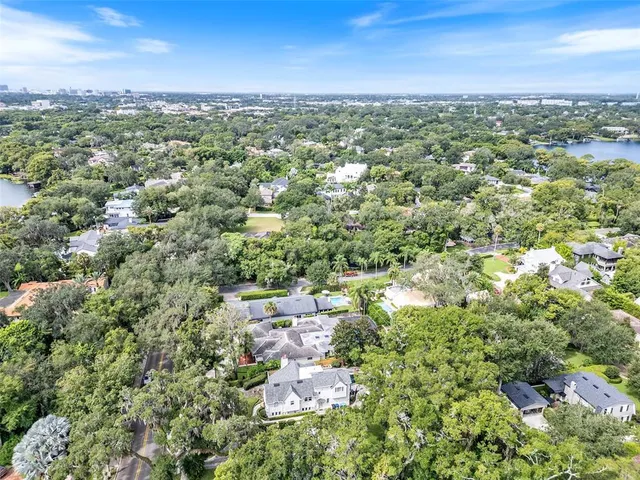 an aerial view of a city with lots of residential buildings