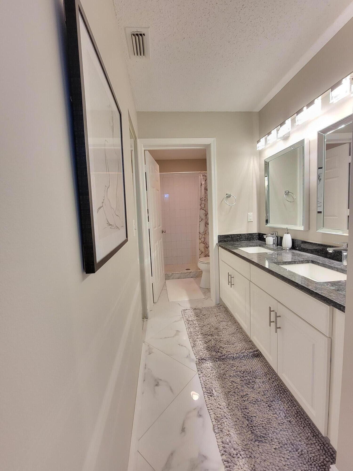 1072 Keystone Drive, Unit E Jupiter, FL 33458 - Photo 12 of 25 20221008_144458