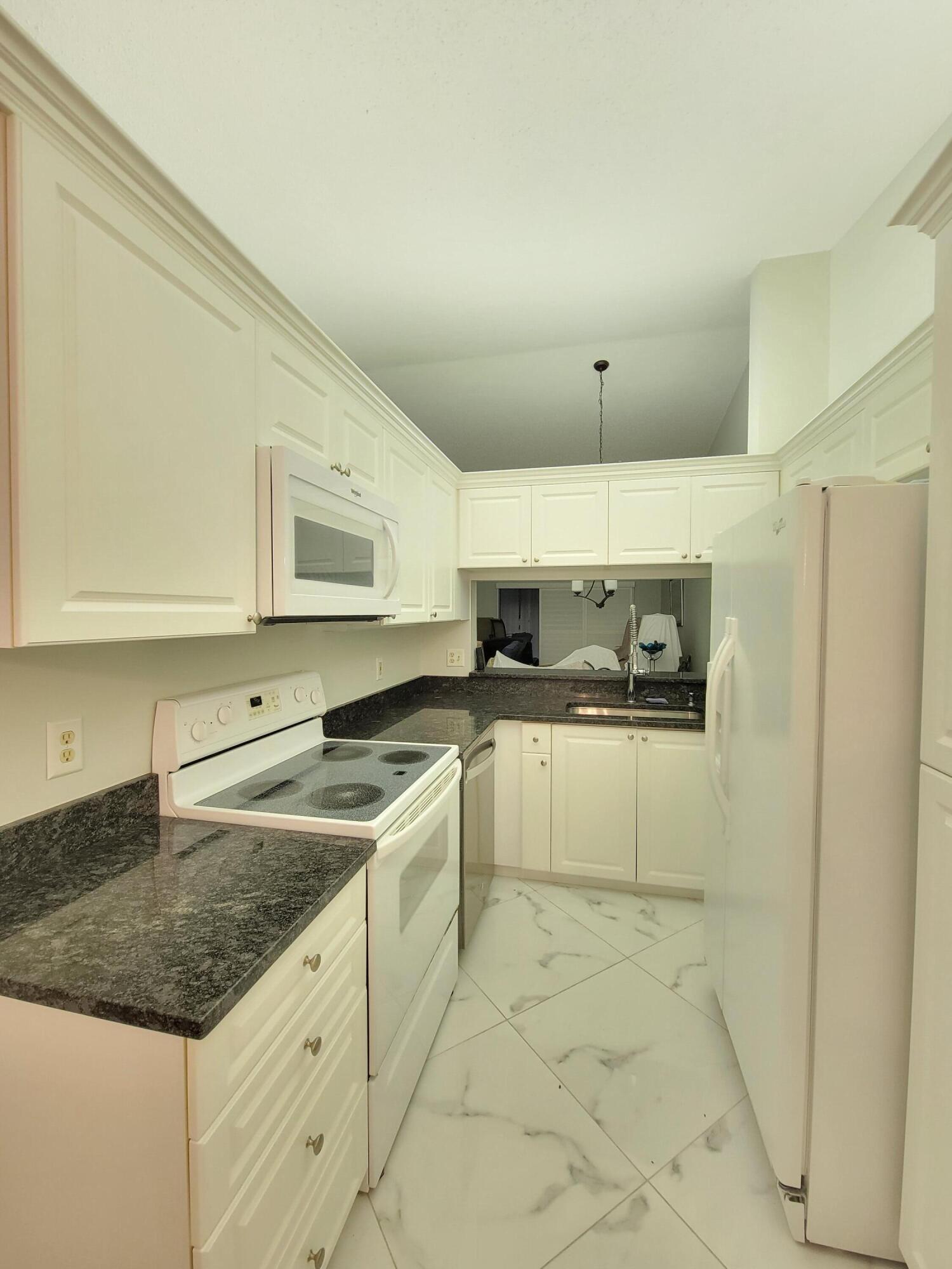 1072 Keystone Drive, Unit E Jupiter, FL 33458 - Photo 8 of 25 20221008_143943