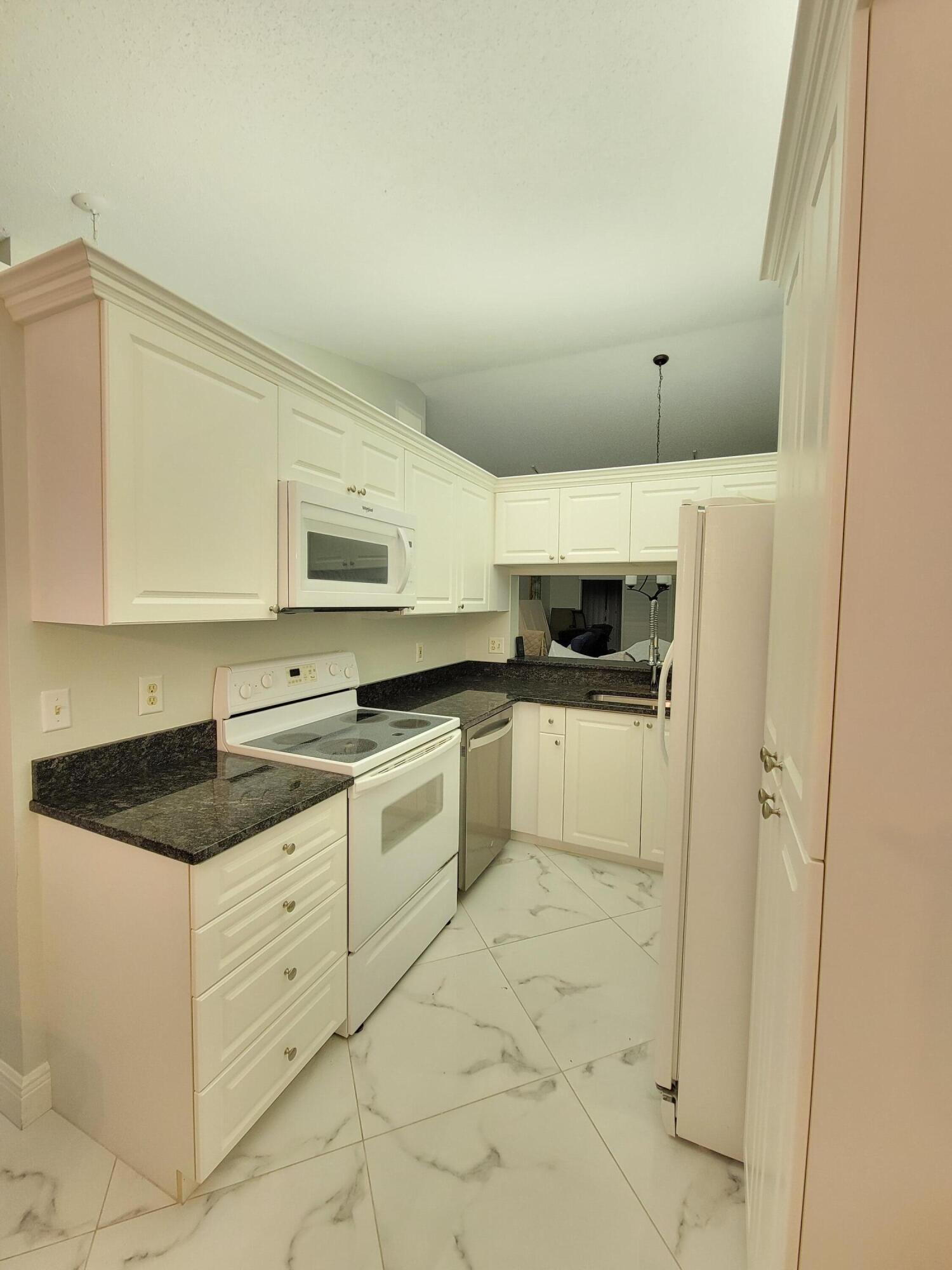 1072 Keystone Drive, Unit E Jupiter, FL 33458 - Photo 9 of 25 20221008_145319