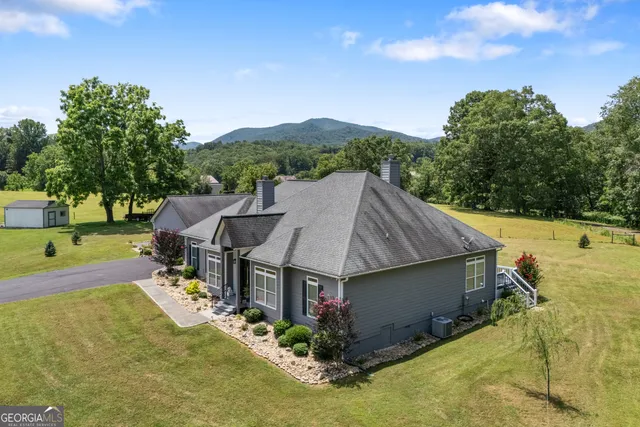 a view of a garden with an outdoor space