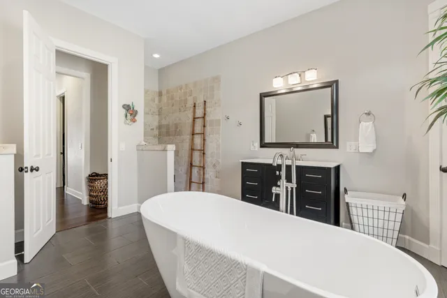 an aerial view of a house with swimming pool and big yard