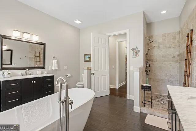 a view of a house with wooden roof and sitting area