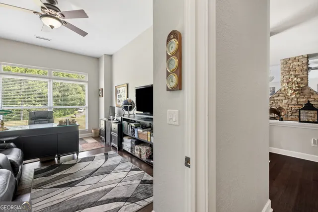 a house that has a tree in front of it