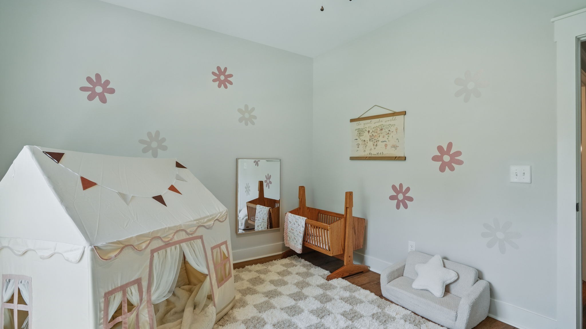 211 Claypool Road Bethpage, TN 37022 - Photo 23 of 73 a bath room with a baby crib and a couch