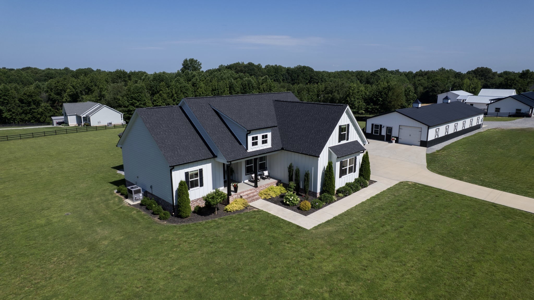 211 Claypool Road Bethpage, TN 37022 - Photo 68 of 73 an aerial view of a house with swimming pool garden and mountain view in back