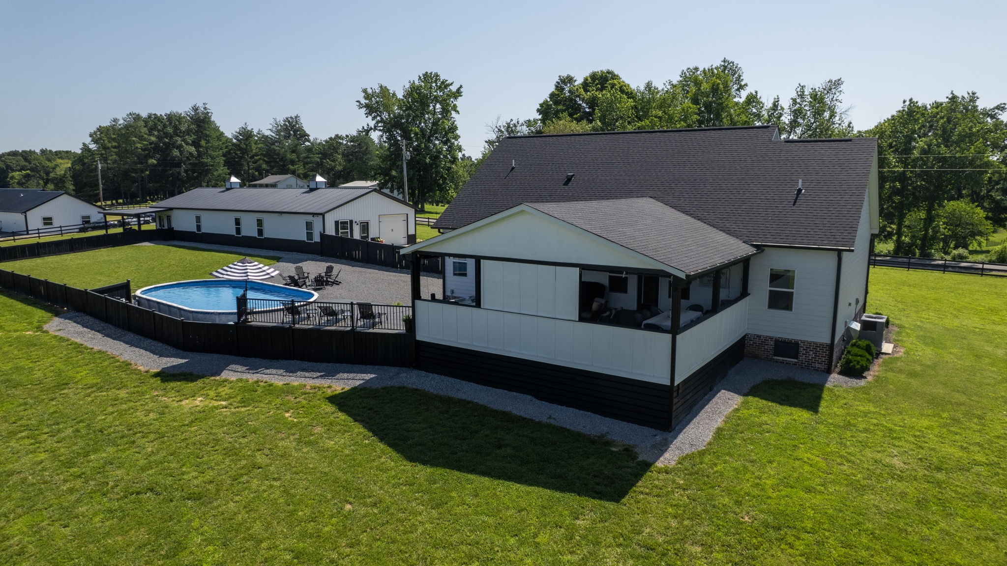 211 Claypool Road Bethpage, TN 37022 - Photo 70 of 73 an aerial view of a house with swimming pool and deck