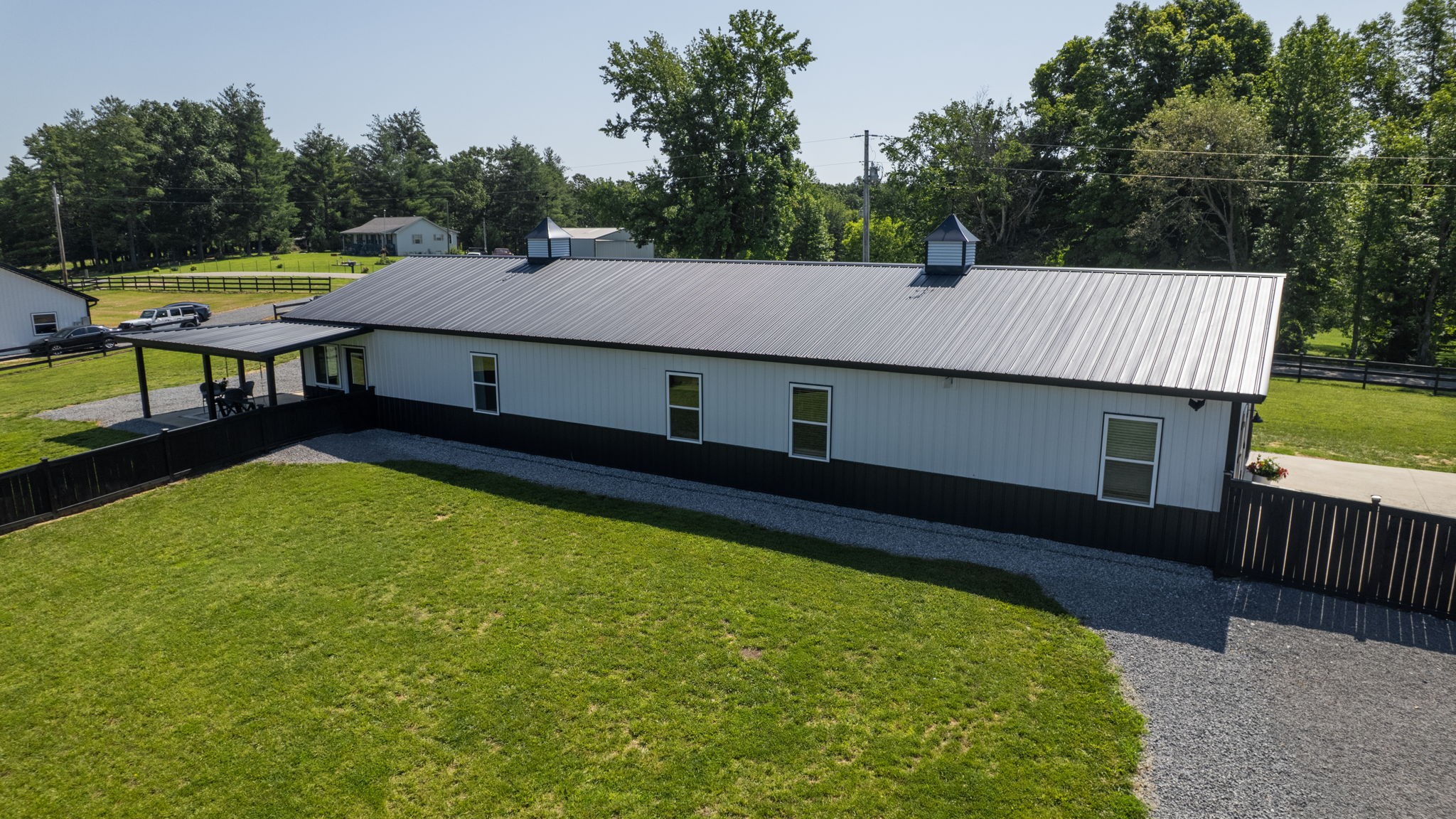 211 Claypool Road Bethpage, TN 37022 - Photo 71 of 73 a aerial view of a house with swimming pool and deck in the back