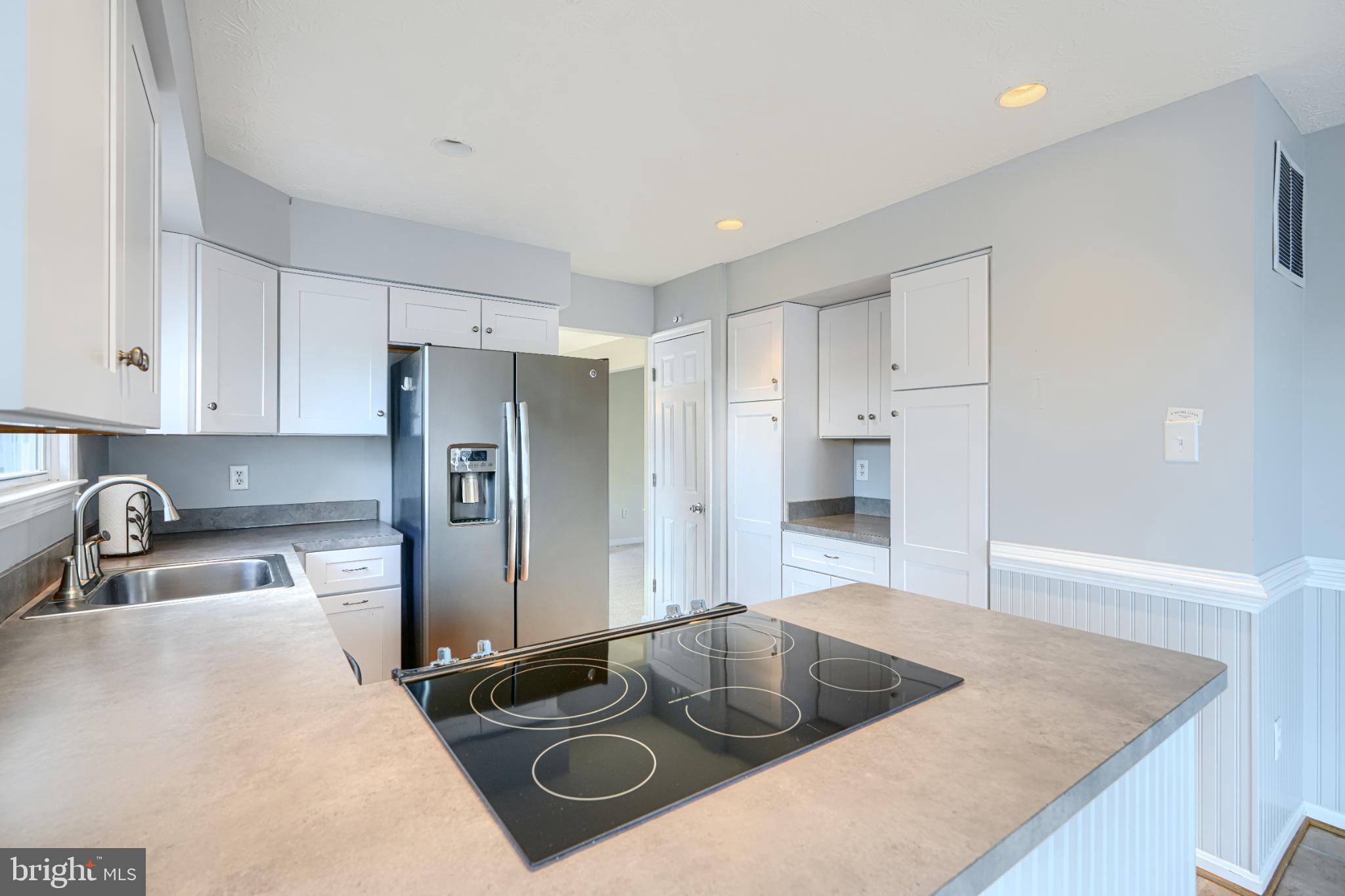 9213 Ramblebrook Road Nottingham, MD 21236 - Photo 11 of 51 Modern kitchen with sleek finishes.