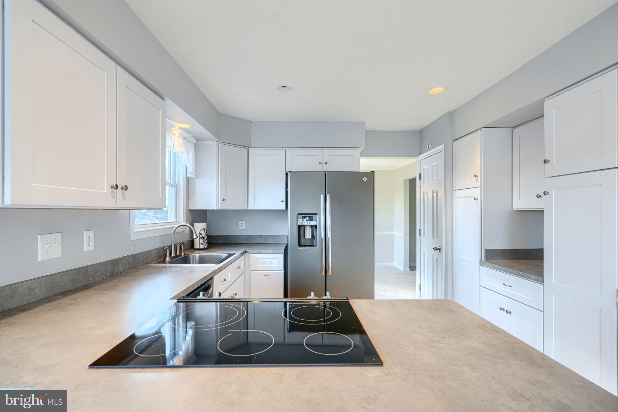 9213 Ramblebrook Road Nottingham, MD 21236 - Photo 15 of 51 Modern kitchen with sleek finishes.