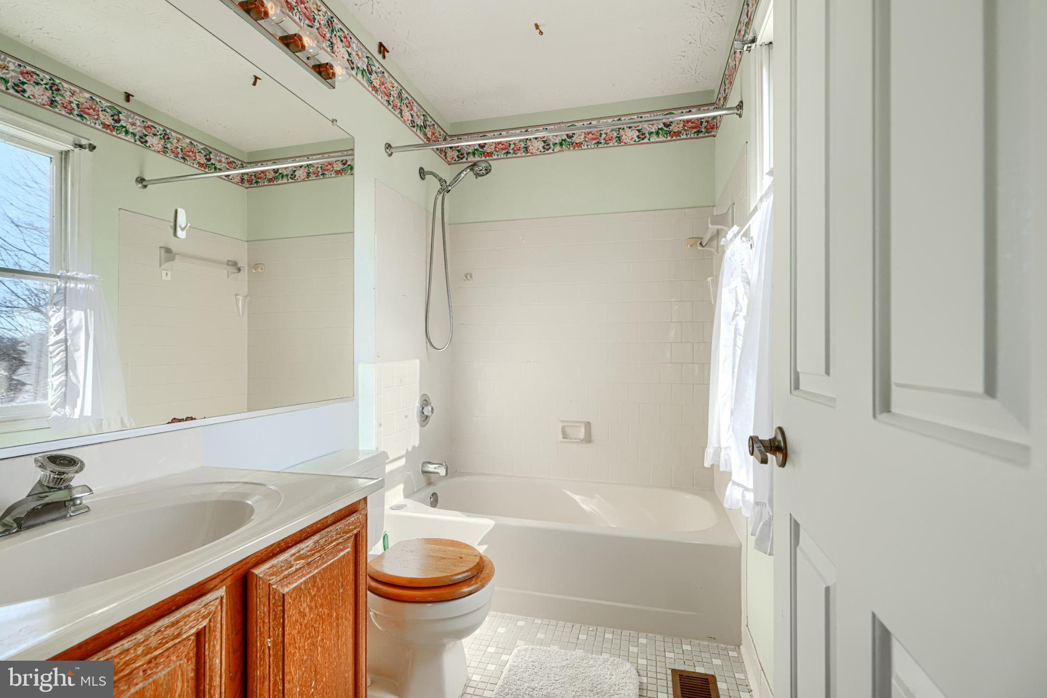 9213 Ramblebrook Road Nottingham, MD 21236 - Photo 28 of 51 Bright and airy bathroom with vintage charm.