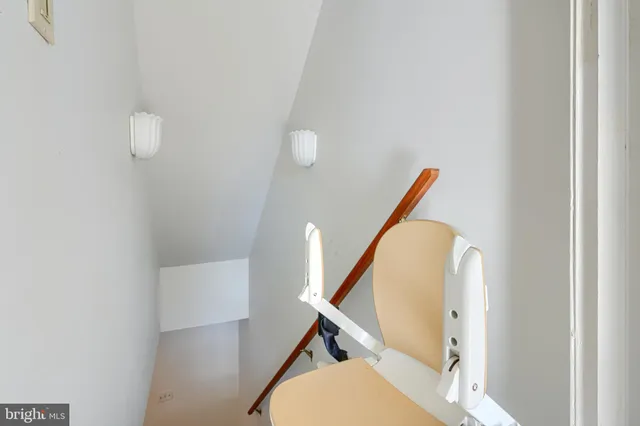 a view of a workspace with furniture