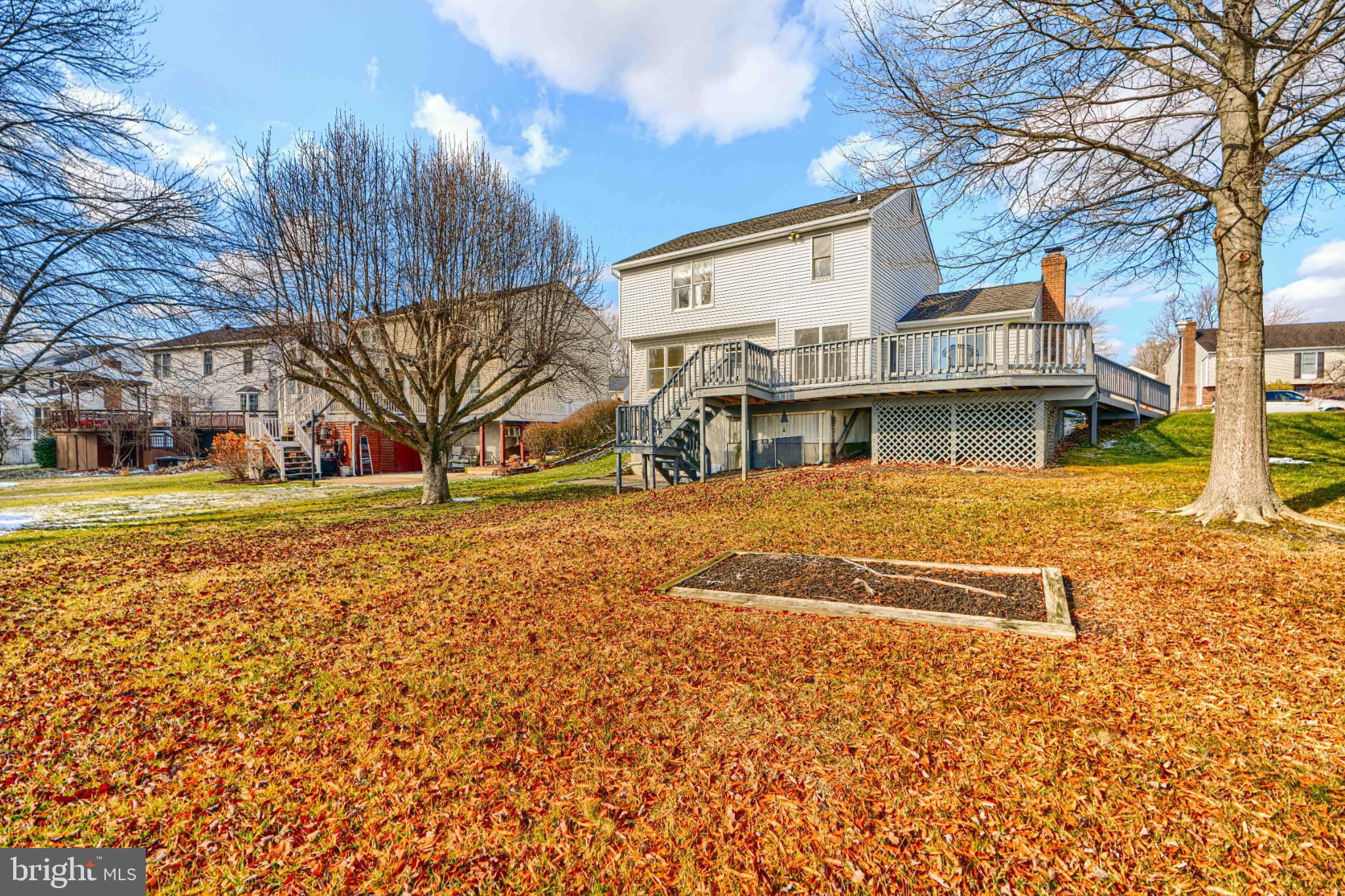 9213 Ramblebrook Road Nottingham, MD 21236 - Photo 49 of 51 Charming home with vibrant autumn landscape.