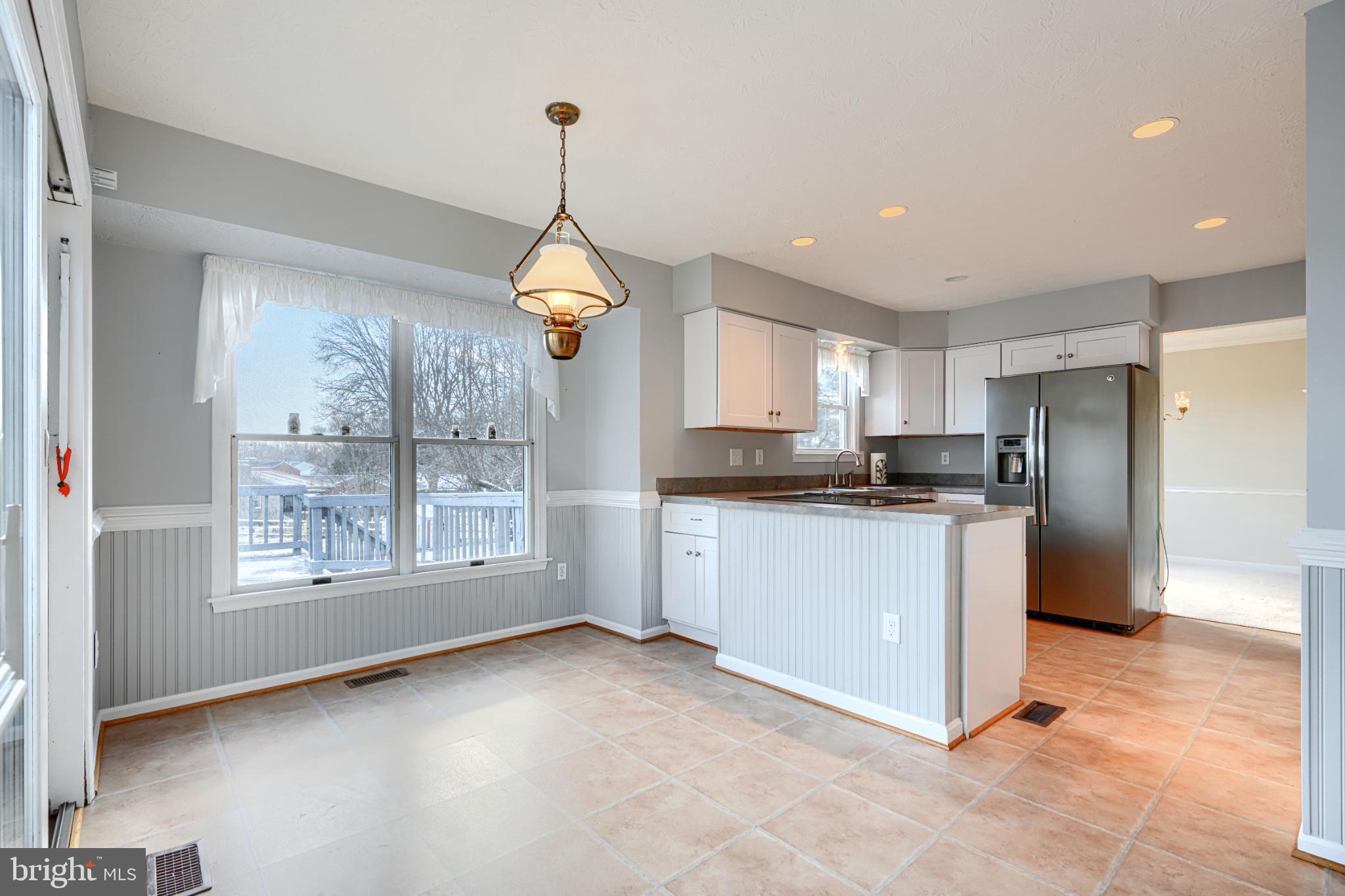 9213 Ramblebrook Road Nottingham, MD 21236 - Photo 9 of 51 Bright and airy kitchen with scenic views.