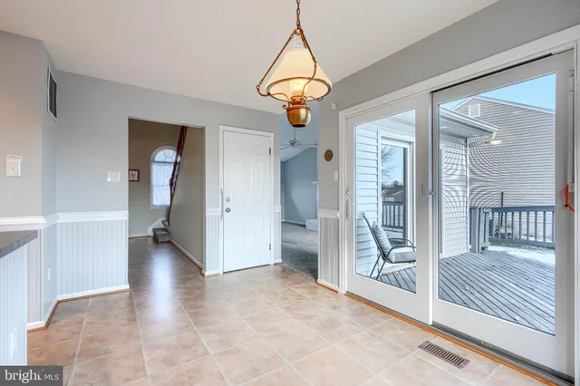 a kitchen with a sink stove and refrigerator