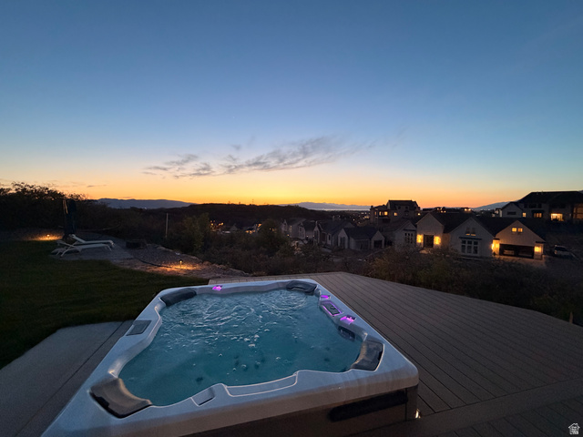 3626 Riverstone Road Mapleton, UT 84664 - Photo 5 of 58 Pool at dusk featuring a wooden deck and a residential view