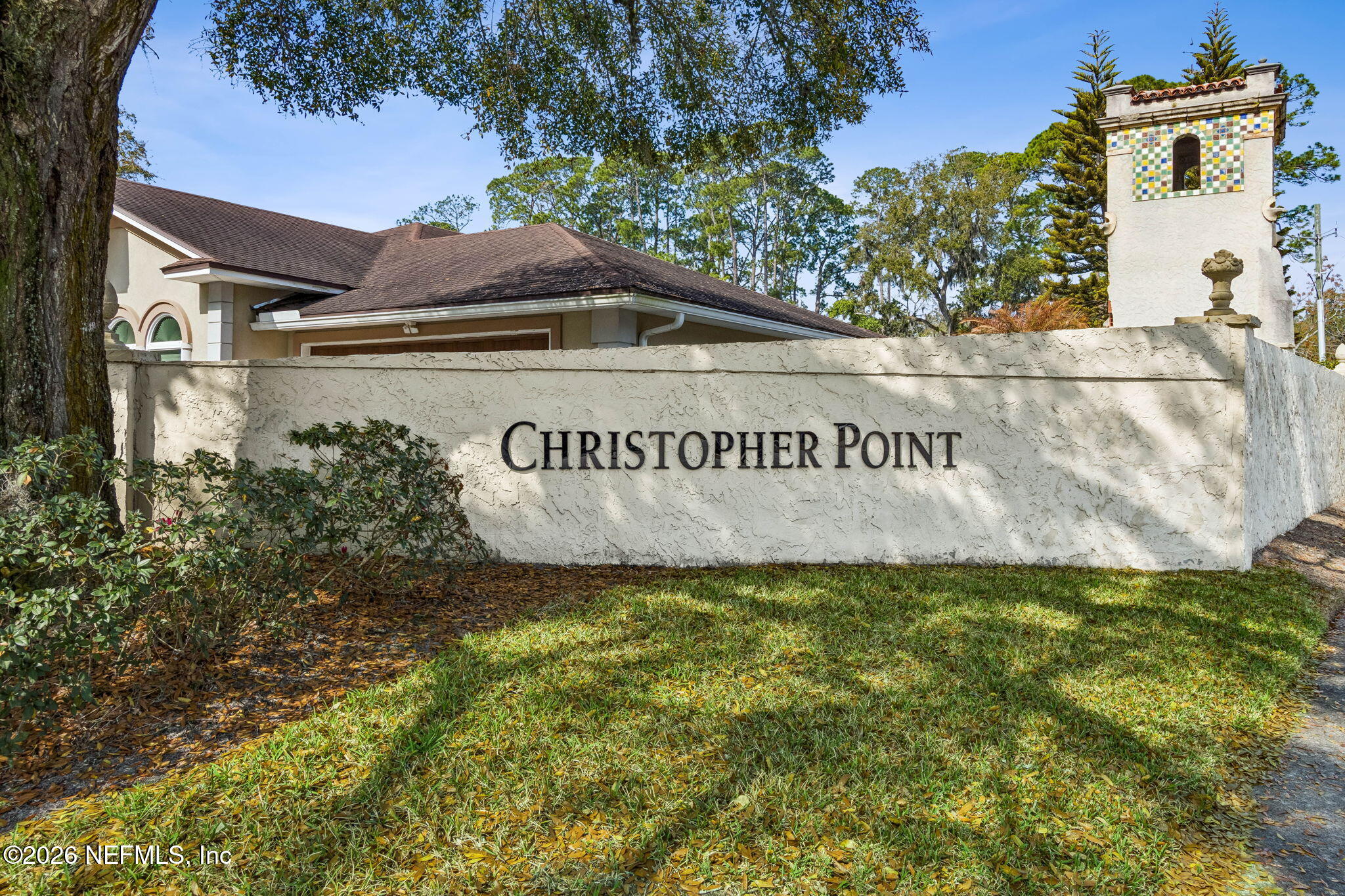1877 Christopher Point Road South Jacksonville, FL 32217 - Photo 25 of 27 a view of outdoor space with garden and signage