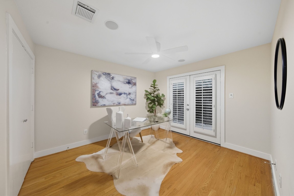 5817 Darling Street, Unit D Houston, TX 77007 - Photo 13 of 40 a view of a livingroom with furniture window and wooden floor