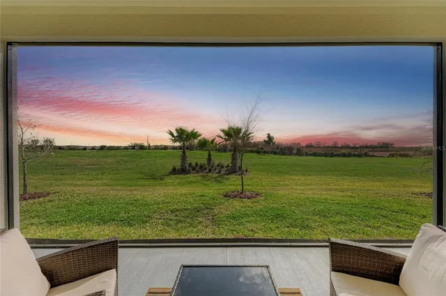 an aerial view of a house with a outdoor space