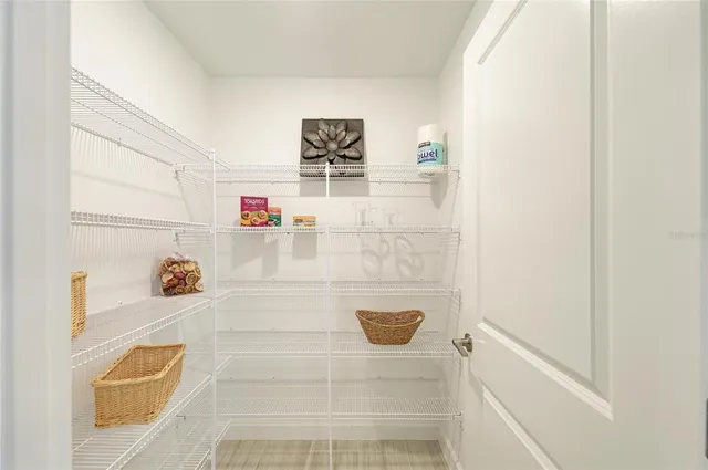a bathroom with a double vanity sink mirror double and bathtub
