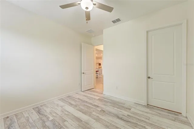 an aerial view of a house with a ocean view