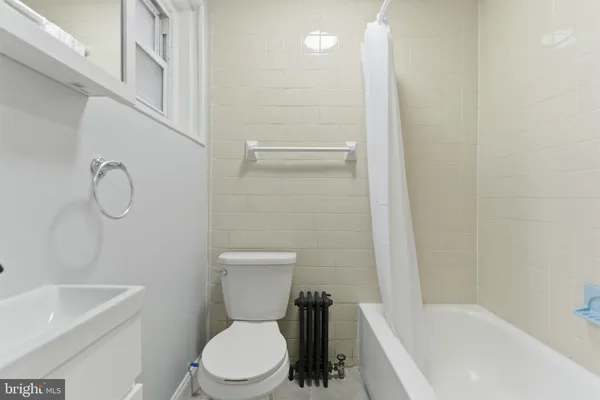 a view of a livingroom with wooden floor