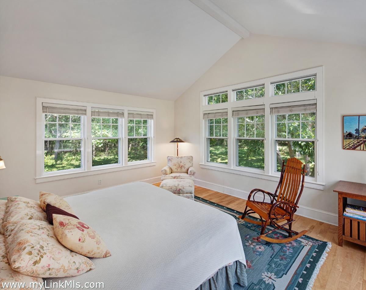 78 Hammett Road Chilmark, MA 02535 - Photo 37 of 53 a bed room with a bed and a chair