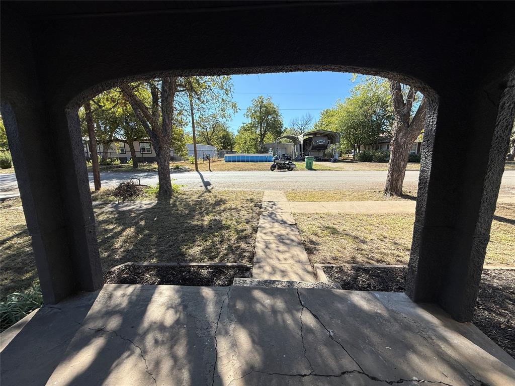 705 East 9th Street Coleman, TX 76834 - Photo 12 of 29 a view of a yard with wooden floor and a yard