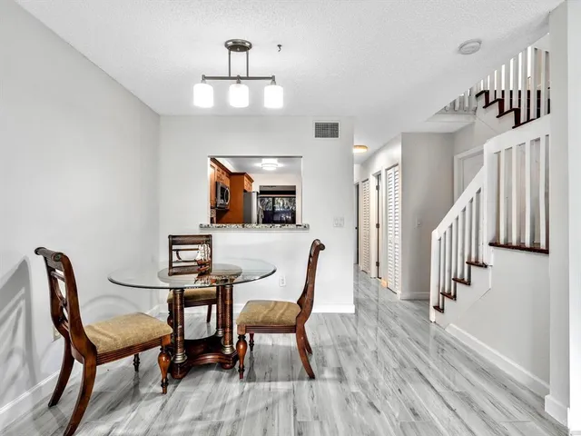 a view of a livingroom with furniture and furniture