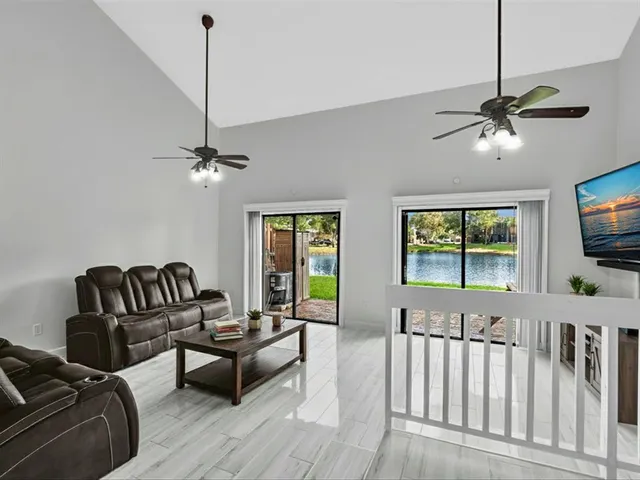 a bedroom with furniture window and wooden floor
