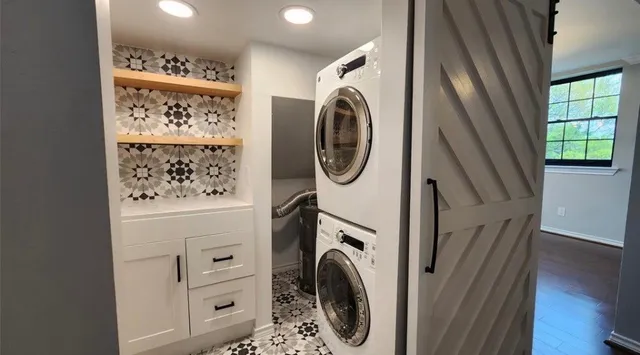 a utility room with dryer and washer
