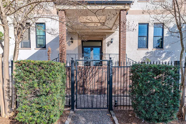 a view of a house with a small garden