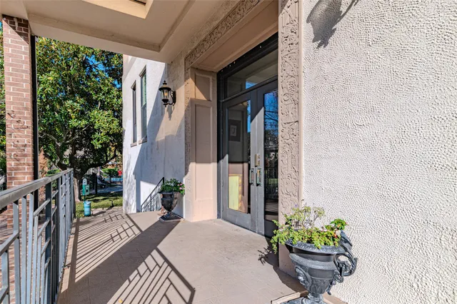 a house with a potted plant on it