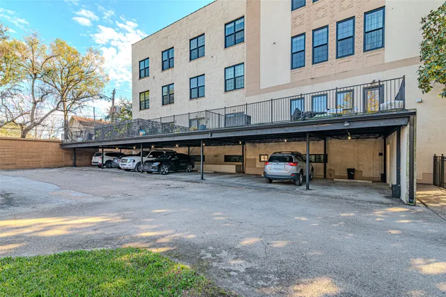 a view of a car park in front of building