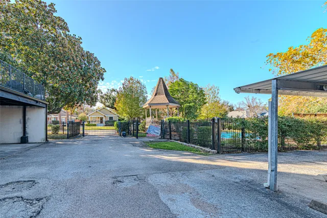 a view of a house with a street