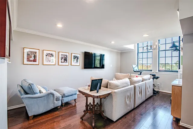 a room with furniture and a wooden floor