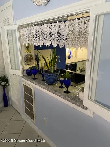 a view of a living room with a lot of stuff