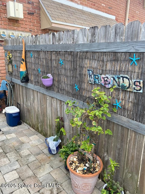 926 Jamestown Avenue, Unit 93 Indian Harbour Beach, FL 32937 - Photo 24 of 31 a front view of a house with garden