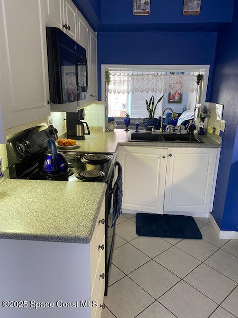 926 Jamestown Avenue, Unit 93 Indian Harbour Beach, FL 32937 - Photo 5 of 31 a room with storage and utility