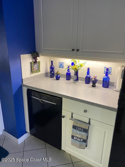 926 Jamestown Avenue, Unit 93 Indian Harbour Beach, FL 32937 - Photo 9 of 31 a kitchen with a sink cabinets and utility